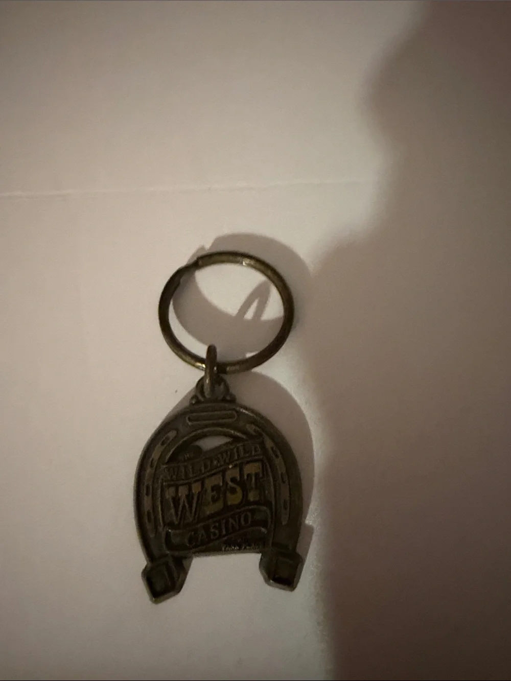 Wild Wild West Casino Las Vegas NV Horseshoe Metal Keychain Vintage Souvenir